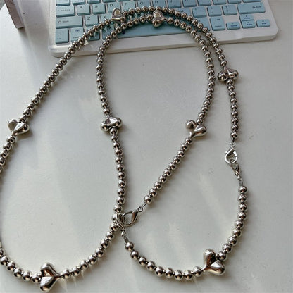 Stylische Herz-Akzent Perlen-Brillenband Brehn