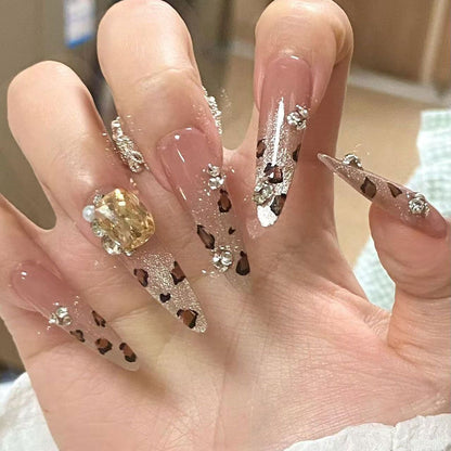 Künstlerische Stiletto Press-On Nägel mit Glitzer und Leoparden-Design Brehn