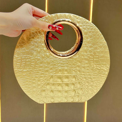 Rundering-Handtasche
