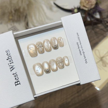 Elegantes mit Schleifen verziertes Press-On Nail Art Set Brehn