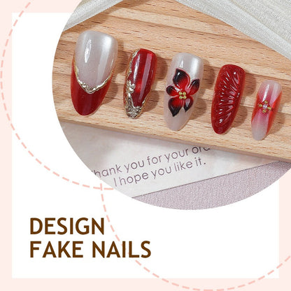 Kunstnagelset mit floralem Design und eleganten Glitzerdetails Brehn