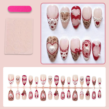 Kunstnagelset mit romantischen Herz- und Schleifenverzierungen Brehn
