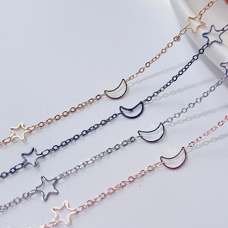 Modische Brillenhalterkette mit Stern- und Mondmotiven Brehn