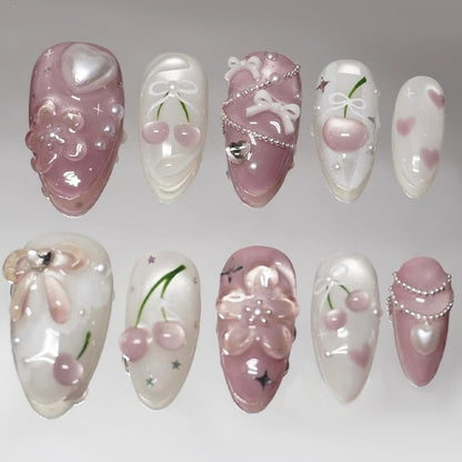 Kunstnagelset mit kreativen Blumen- und Glitzerelementen Brehn