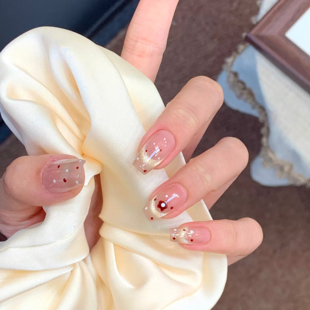 Dekoratives Press-On Nagelset mit floralen und Schleifenakzenten Brehn
