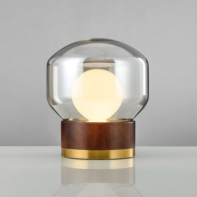 Moderne Glas Tischlampe mit Holzfuß und goldenen Akzenten