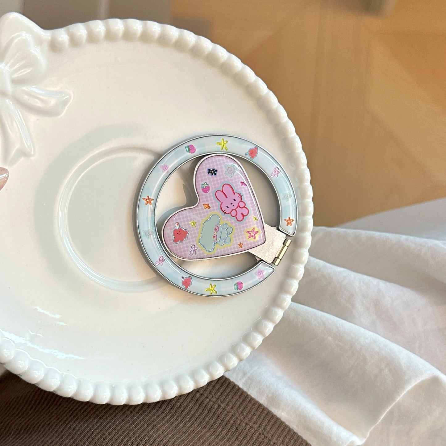 Herzförmiger Smartphone Fingerhalter mit Kawaii Design Brehn