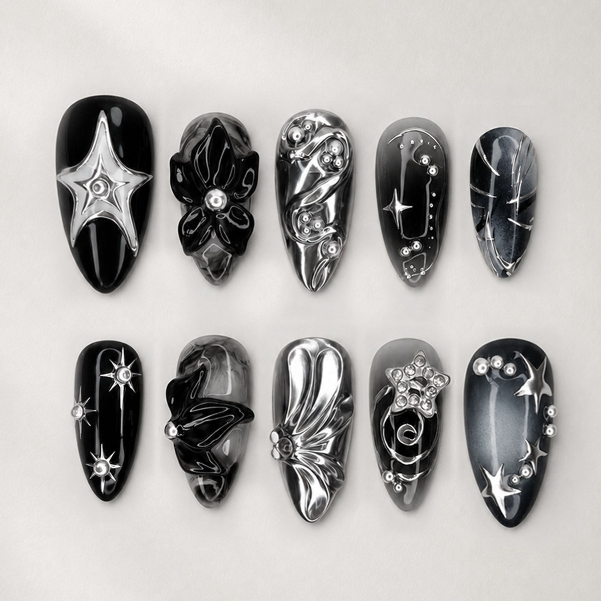 Kunstnagelset mit glamoureusen Designs und einzigartigen 3D-Elementen Brehn