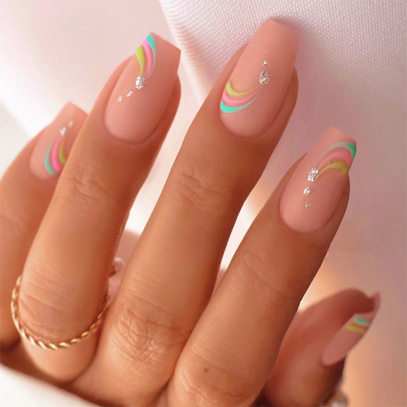 Künstlerisches Press-On-Nagelset mit bunten Wellenmustern Brehn