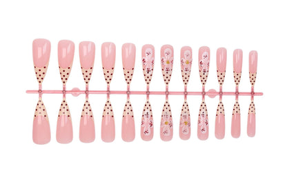 Kunstnagelset mit eleganten Blüten- und Punktemotiven Brehn