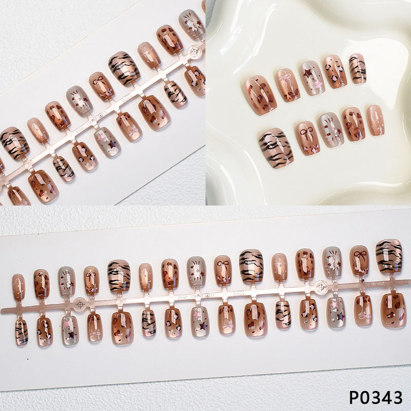 Verspieltes Tierdruck Press-On Nagelset Brehn