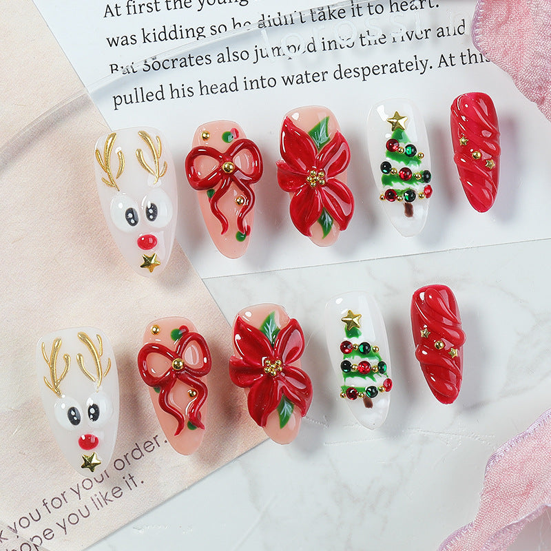 Kreatives Weihnachtskunstnagelset mit festlichen Motiven und Glitzerakzenten Brehn