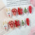 Kreatives Weihnachtskunstnagelset mit festlichen Motiven und Glitzerakzenten Brehn