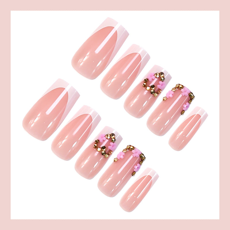 Kunstnagelset mit filigranen Blüten- und Glitzerakzenten Brehn