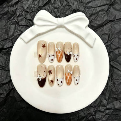 Dekoratives Press-On Nagelkunstset mit einzigartigen Bogen- und Stern-Designs