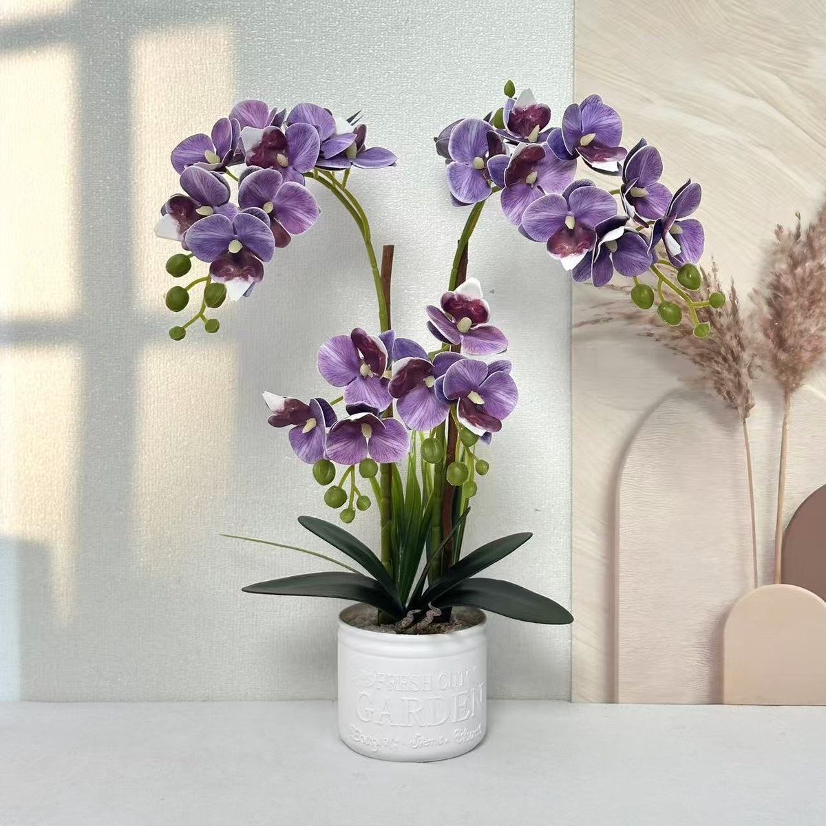 Dekorative Topfpflanzen-Orchideen-Anordnung für Tischdeko