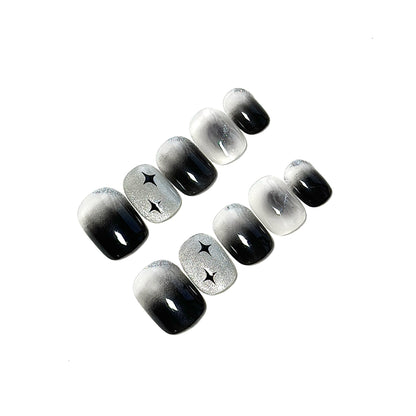 Künstlerisches Ombre Press-On Nagelset mit Sternakzenten