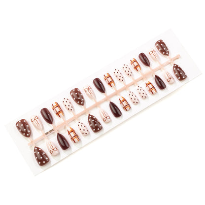 Dekoratives Press-On Nagelkunstset mit Schleifen- und Punkte-Designs Brehn