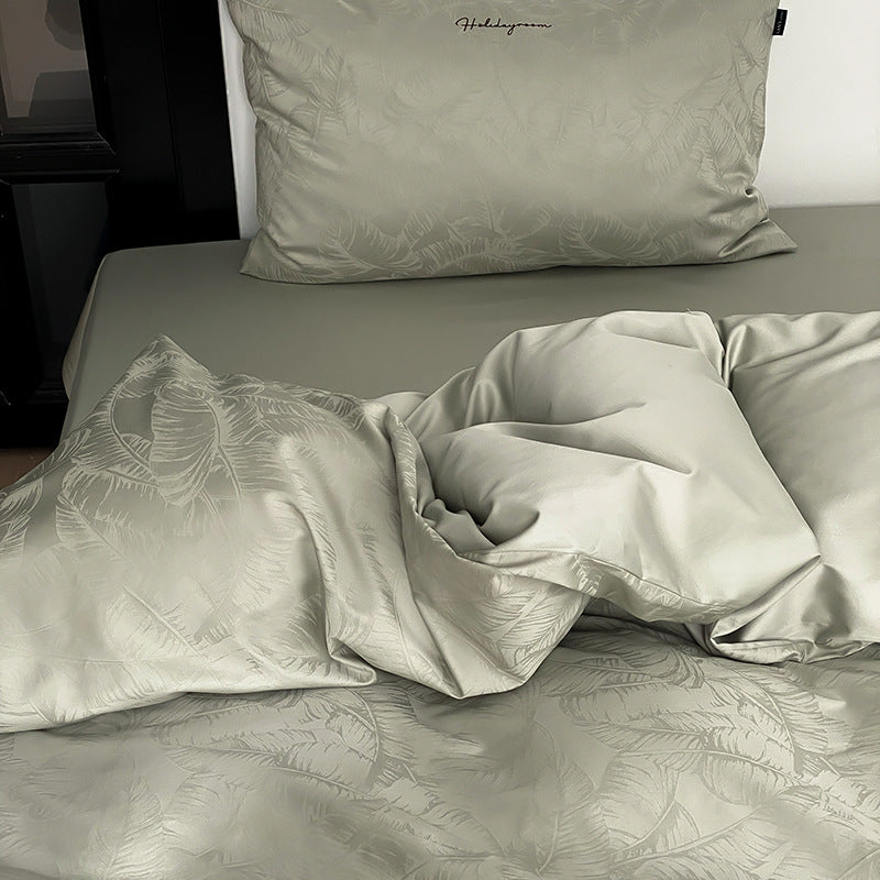 Premium-Satin-Bettwäschegarnitur mit geprägtem Monstera-Blattrelief und knitterarmem Finish