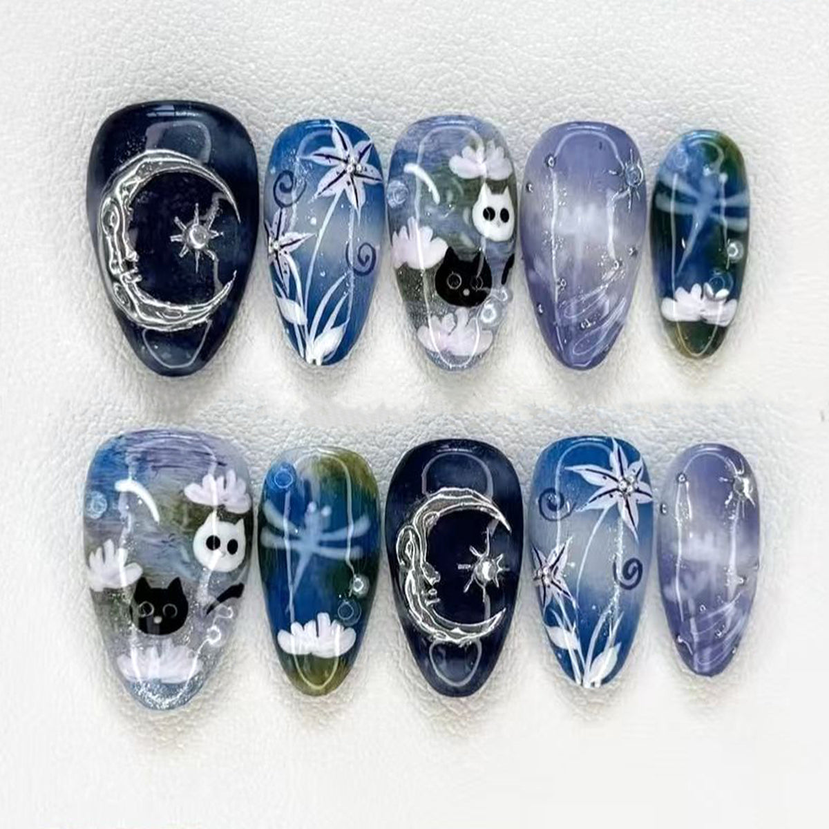 Künstlerisches Press-On Nagelkunst Set mit von der Natur inspirierten Designs Brehn