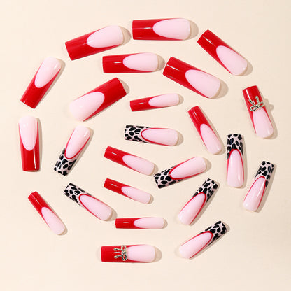 Stylische Acryl-Nagelerweiterungen mit Schleife und Leopardenmuster Brehn