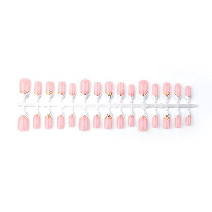 Elegantes French Tip Press-On Nagelkunstset mit goldenen Akzenten Brehn