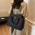 Elegante strukturierte Handtasche Brehn