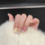 Dekorative Press-On Nagelkunst-Set mit charmantem Schleifen- und Musterdesigns Brehn
