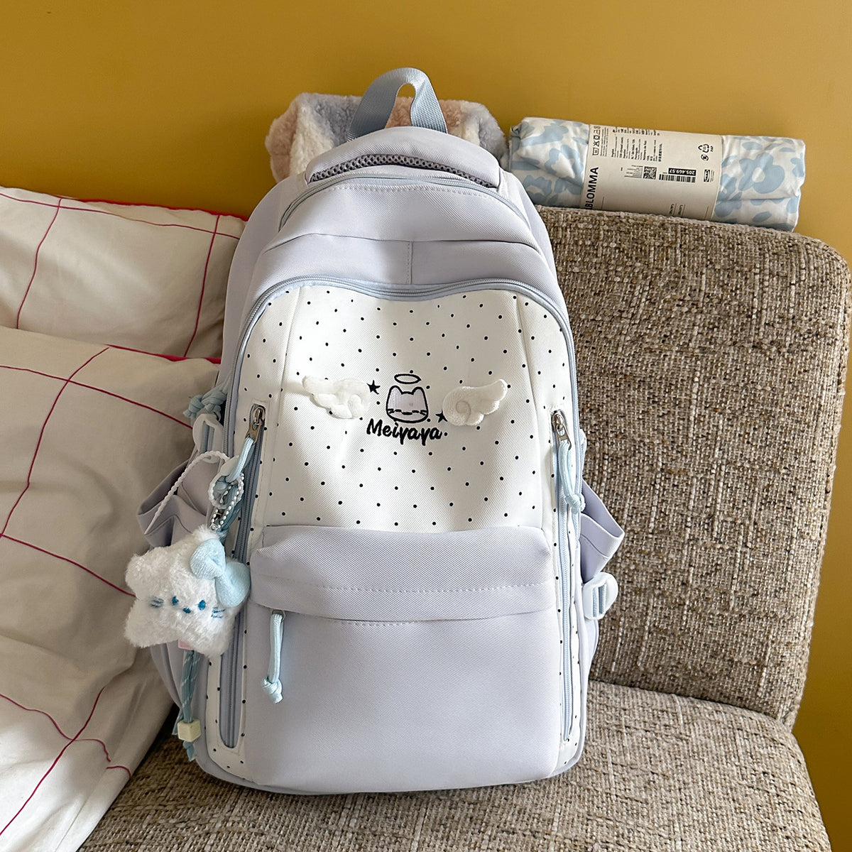 Stylischer gepunkteter Rucksack mit dekorativen Akzenten Brehn