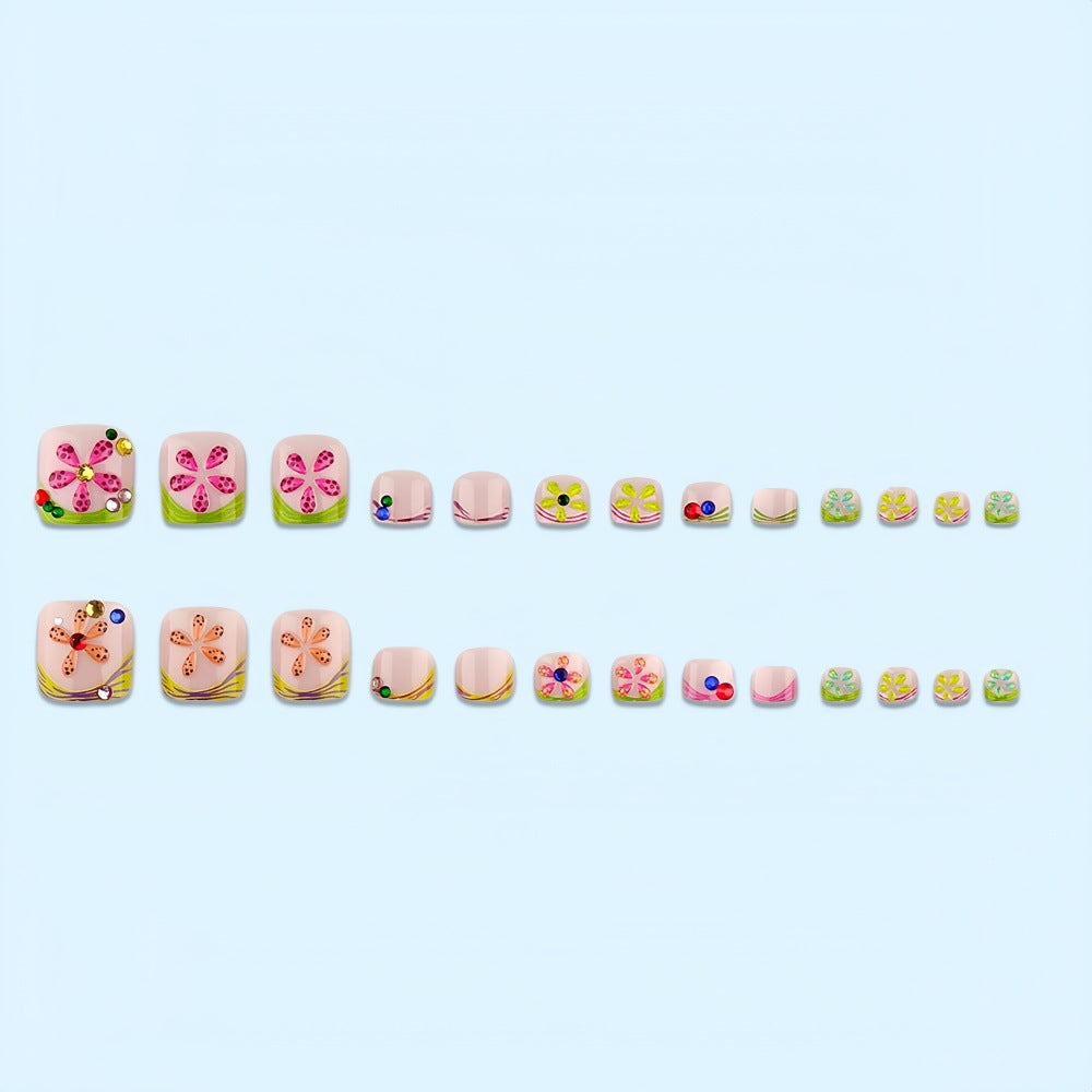 Kunstvolle Fußnägel mit bunten Blumendekoren Brehn