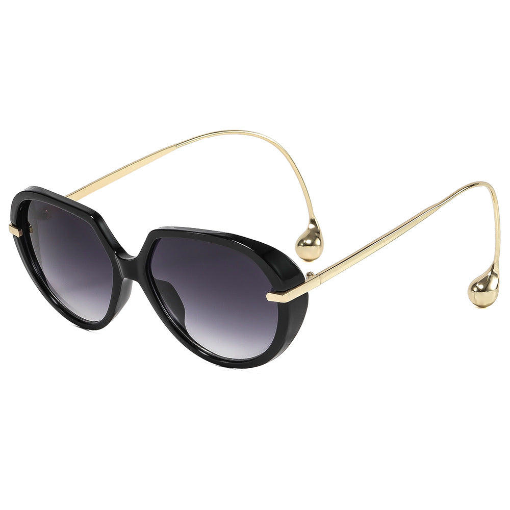 Damen Cat-Eye Sonnenbrille mit goldenen Akzenten und stylishem Rahmen Brehn