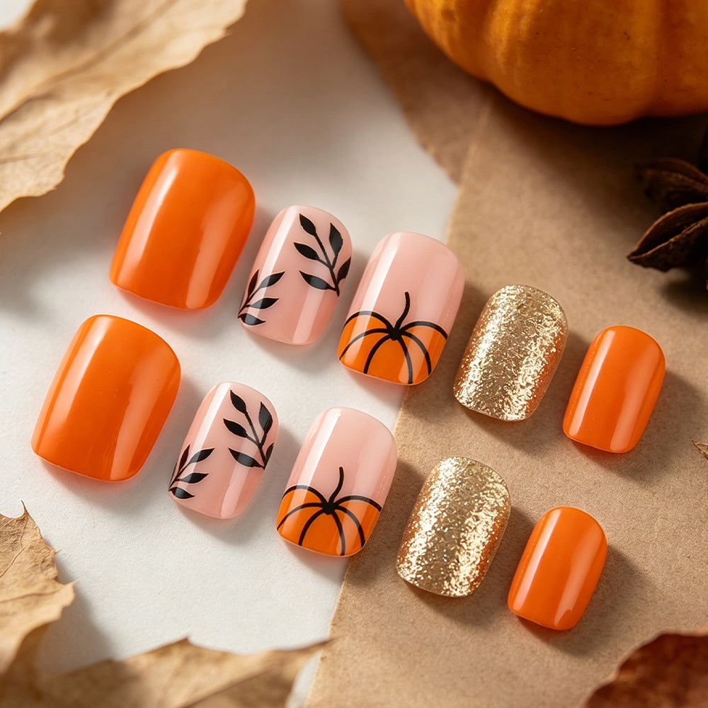 Dekorativer Press-On Nagelkunst-Set mit Kürbisdesign Brehn