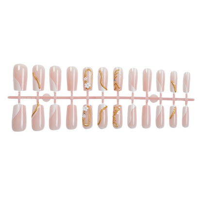 Kunstnagelset mit elegantem Goldakzent und floralen Designs Brehn