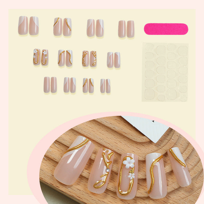 Künstlerisches Press-On-Nagelset mit goldenen Akzenten Brehn