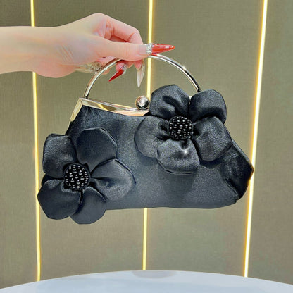 Florale Akzent Clutch