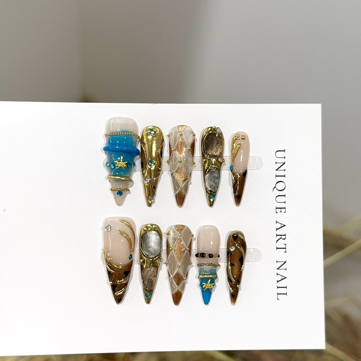 Künstlerisches Lang-Stiletto Press-On Nagelset