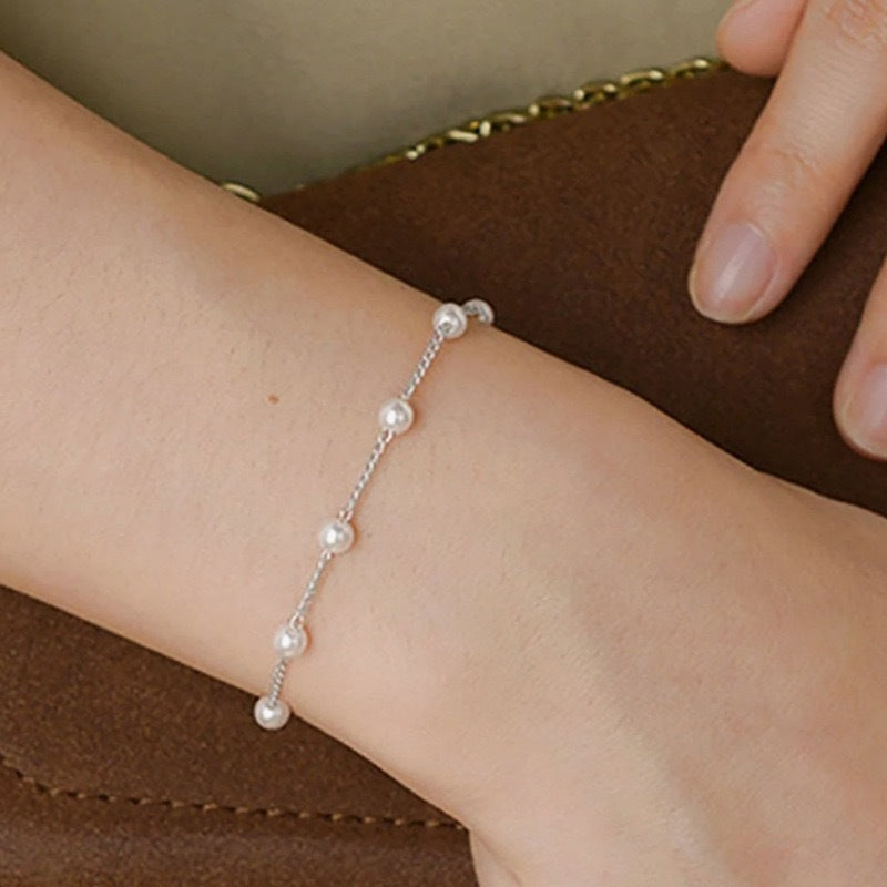 Elegante Perlenakzent-Kettenarmband Brehn