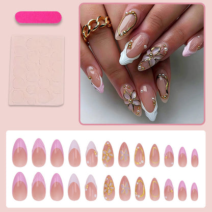 Kunstnagelset mit floralen und glitzernden Verzierungen Brehn