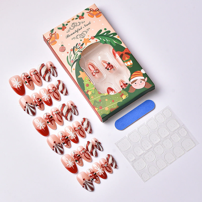 Kunstnagelset mit festlichen Weihnachtsmotiven und eleganten Verzierungen Brehn
