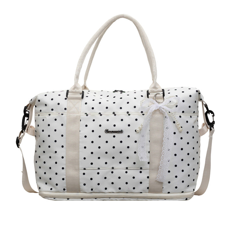 Stylische gepunktete Reisetasche