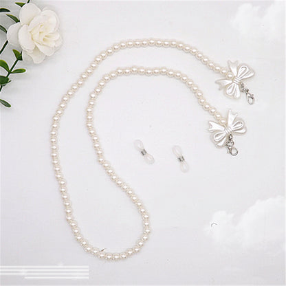 Elegante Perlen-Brillenkette mit Schleifenanhängern Brehn