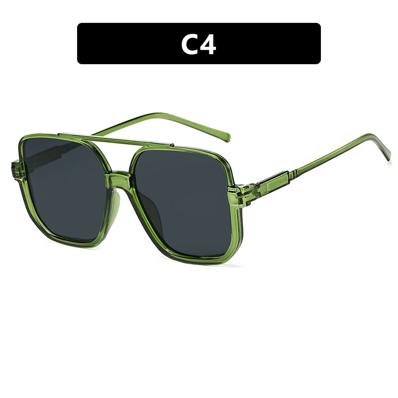 Damen quadratische Sonnenbrille mit transparentem Rahmen und grün getönten Gläsern Brehn