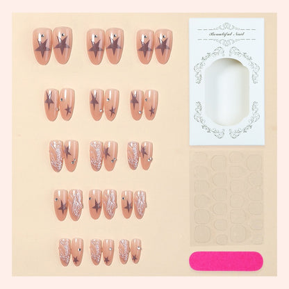 Kunstnagelset mit eleganten Stern- und Glitzerdetails Brehn
