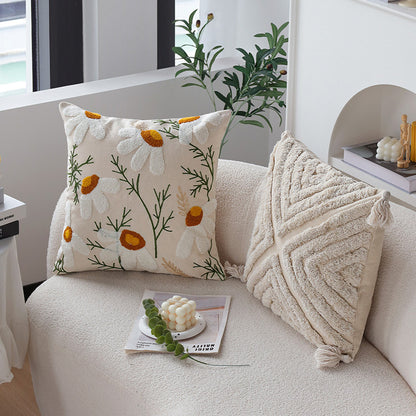 Dekoratives Kissen mit floralem Stickdesign