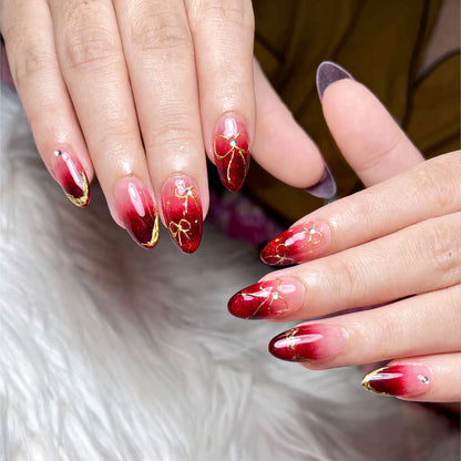 Künstlerisches Ombre Press-On Nail Art Set mit goldenen Akzenten Brehn
