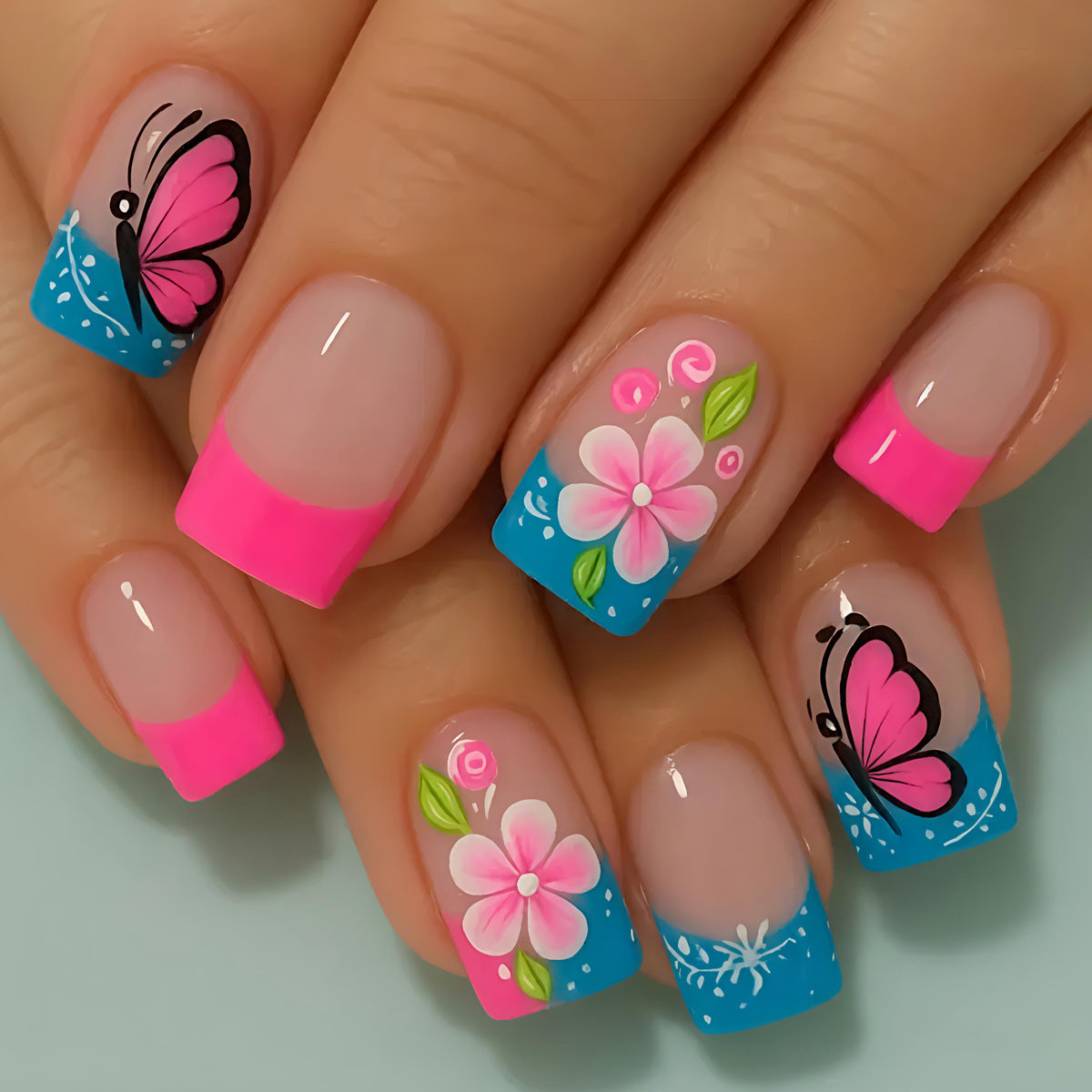 Kunstnägel mit Kreativem Blumen- und Schmetterlingsdesign Brehn