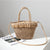 Geflochtene Basttasche mit Dekorativem Quastendetail Brehn