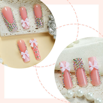 Kunstnagelset mit eleganten Schleifen- und Glitzerakzenten Brehn