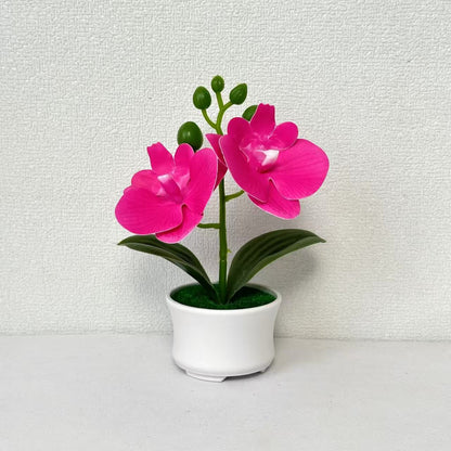 Elegante künstliche Orchideenpflanzenanordnung für die Innendekoration