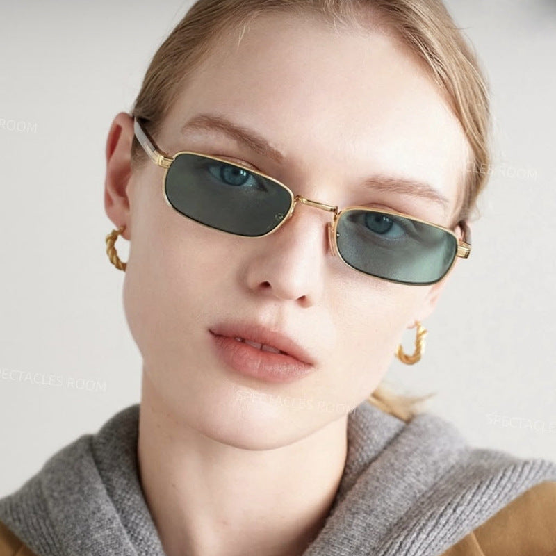 Damen modische Sonnenbrille mit stilvollem Metallrahmen und orangefarbenen Gläsern Brehn